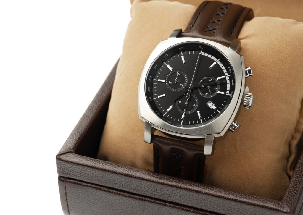 Mechanical watch isolated on white background, close up